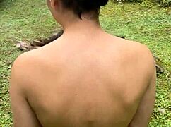 Young beauty sucks naked in nature