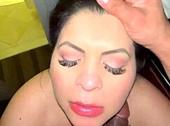 This mature milf is sucking passionately in the bedroom scene with intense oral action.