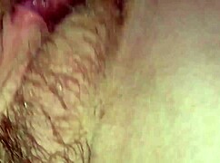 Pretty teen girl inserts toy into wet puffy muff