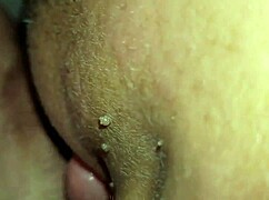 Pretty teen girl inserts toy into wet puffy muff