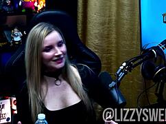 Lizzy sweet teases with her tits out
