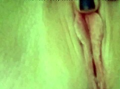 Blonde stripper Lexi Grant plays with her pussy while ripping clothes.