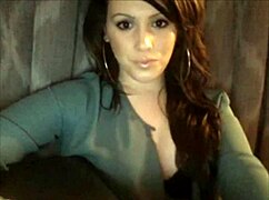 Beautiful transsexual engages in subtle teasing on camera