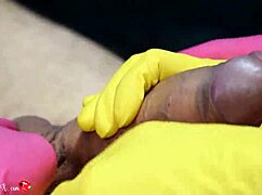 Four hands latex glove handjob fun