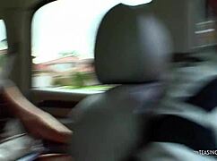 Once her body is oiled the brunette allows the big white object to stretch her interior