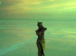 mature women dancing under pink sky with white salt