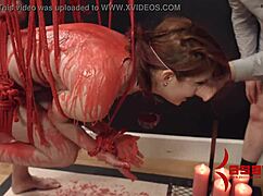 redhead babe, feel this hot wax drip!