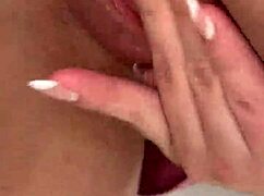 Hot blonde dances funk in kitchen