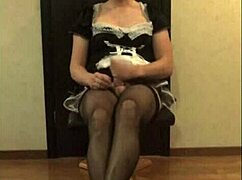 gay sissyboy in french maid fishnet jerks off intensely, showing crossdressing style boldly