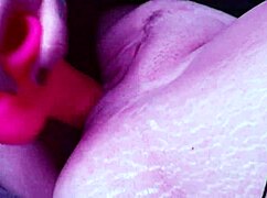 Milf fucks pink dildo in heels and stockings