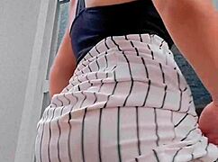 Sexy Redhead Cleans Window And Shows Off To Neighbor