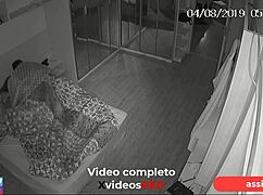 Security camera catches married woman and lover in hotel.