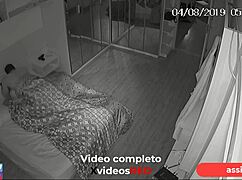 Security camera catches married woman and lover in hotel.