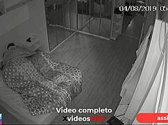 Security camera catches married woman and lover in hotel.