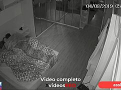 Security camera catches married woman and lover in hotel.