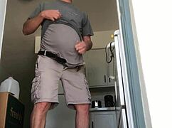 Mature shaved amateur intensely jacks off his cock at the door