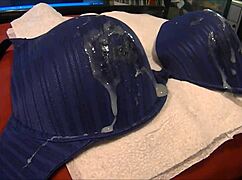 Feeling wild while stroking and spilling on blue 38D bra.