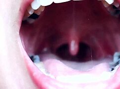 Hungry giantess towers over tiny prey