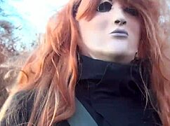 Redhead In Mask And Boots Outdoors