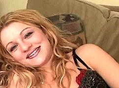 Blonde babe in lingerie masturbates her clit solo.