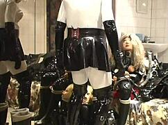 roxina2007 ebony babe and doll in rubber outfit for a casual video shoot