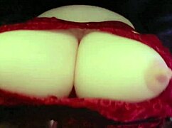 Babe does rocket titjob using toys for cumshot