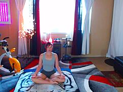 sexy redhead milf stretches barefoot in yoga session, showing off hot feet and mommy curves for fetish fans