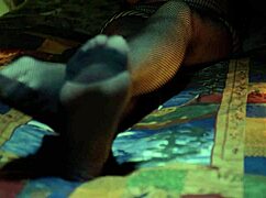 Perfect toes peeking through sexy fishnets on a milf housewife. She teases with nylon stockings and amateur fetish play.