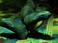 Perfect toes peeking through sexy fishnets on a milf housewife. She teases with nylon stockings and amateur fetish play.