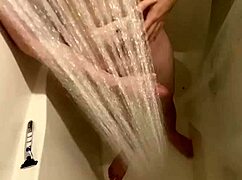 hidden shower cam reveals shaved guy jerking off to cumshot