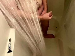 hidden shower cam reveals shaved guy jerking off to cumshot