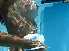 Sexy Brunette MILF Angelica Strips Naked By The Pool With Big Tits