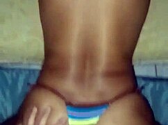 beautiful brunette looks sexy in lingerie while cheating outdoors