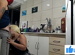 Hot stepmom in the kitchen gives a sloppy blowjob to her lover.