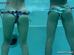 Booty shaking underwater in high definition, showcasing sexy curves.
