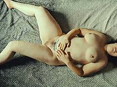 a milf amateur lounges and stretches in a sexy homemade setting