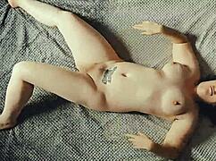 a milf amateur lounges and stretches in a sexy homemade setting