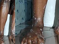 cyndy blackslave washes feet in closeup