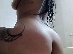 colombiana gets horny in the shower with fingering