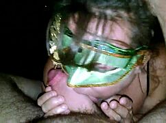 this milf in green mask is licking and sucking a thick cock 😍