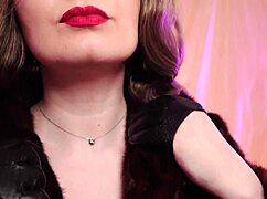 Arya Grander in fur coat and leather gloves vaping