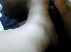 sexy girl gives footjob and makes him cum