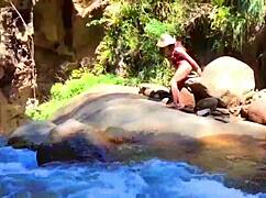 lilyan is masturbating with toys on the river banks.