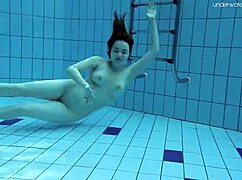 Lada Poleshuk shows big tits underwater in the pool