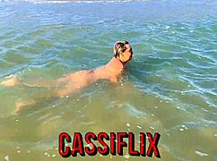 Showing off at the beach, he fucks me doggystyle wildly.