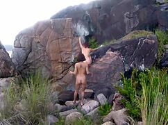 Wild cougar Deauxma contrasts soft lingerie with rough strap-on fucking Angie Noire's pussy.