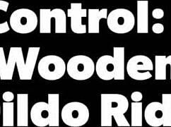 Tropicalpussy obeys master's remote instructions for intense wooden smack and dildo ride.