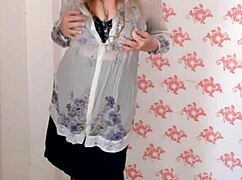 Mariaold milf teases with big natural tits in black stockings