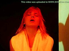 Blonde dances nude in sauna at night club