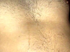 two chubby men in a gay sex scene on the bed